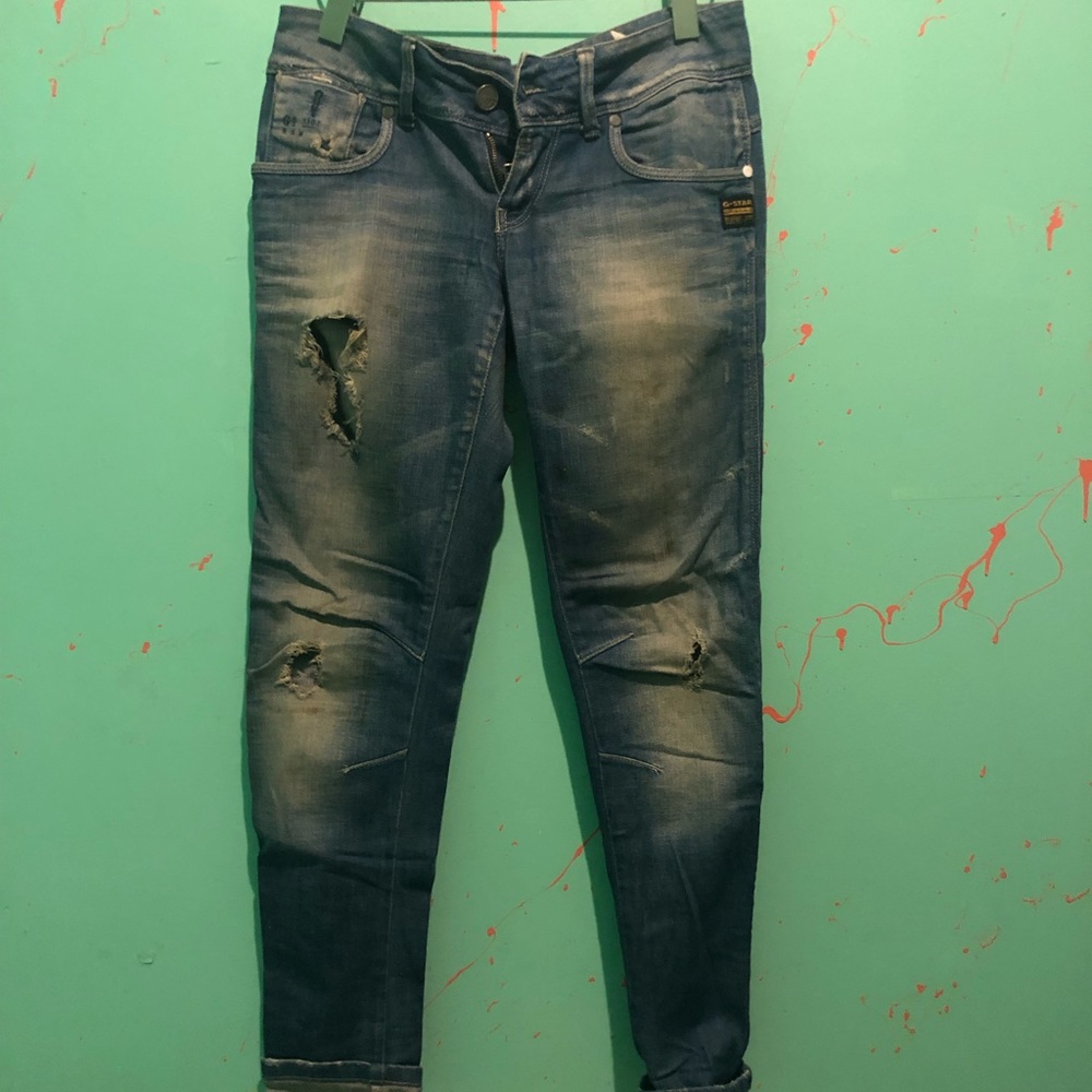 Medium wash denim with destruction